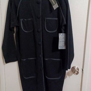 Ladies black dress. Never worn. Size LX.  100% wool